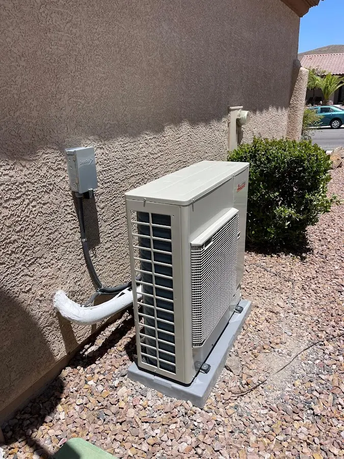 Residential air conditioning condenser unit in Benton